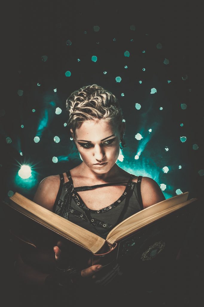 Steampunk girl with a book